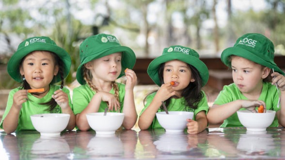 "3 Children eating healthy Chef cooked meals at Edge Early Learning Bellbird Park