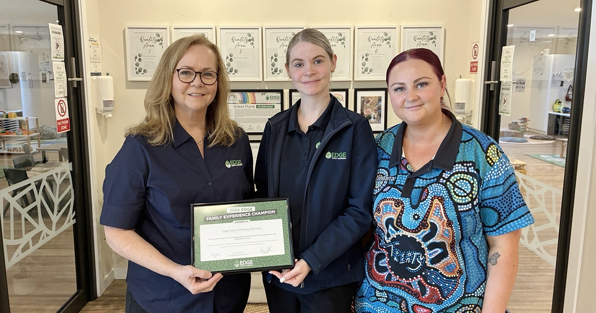 Area Manager Kathryn presenting the Family Experience Champion Award to Edge Wynnum Centre Director.